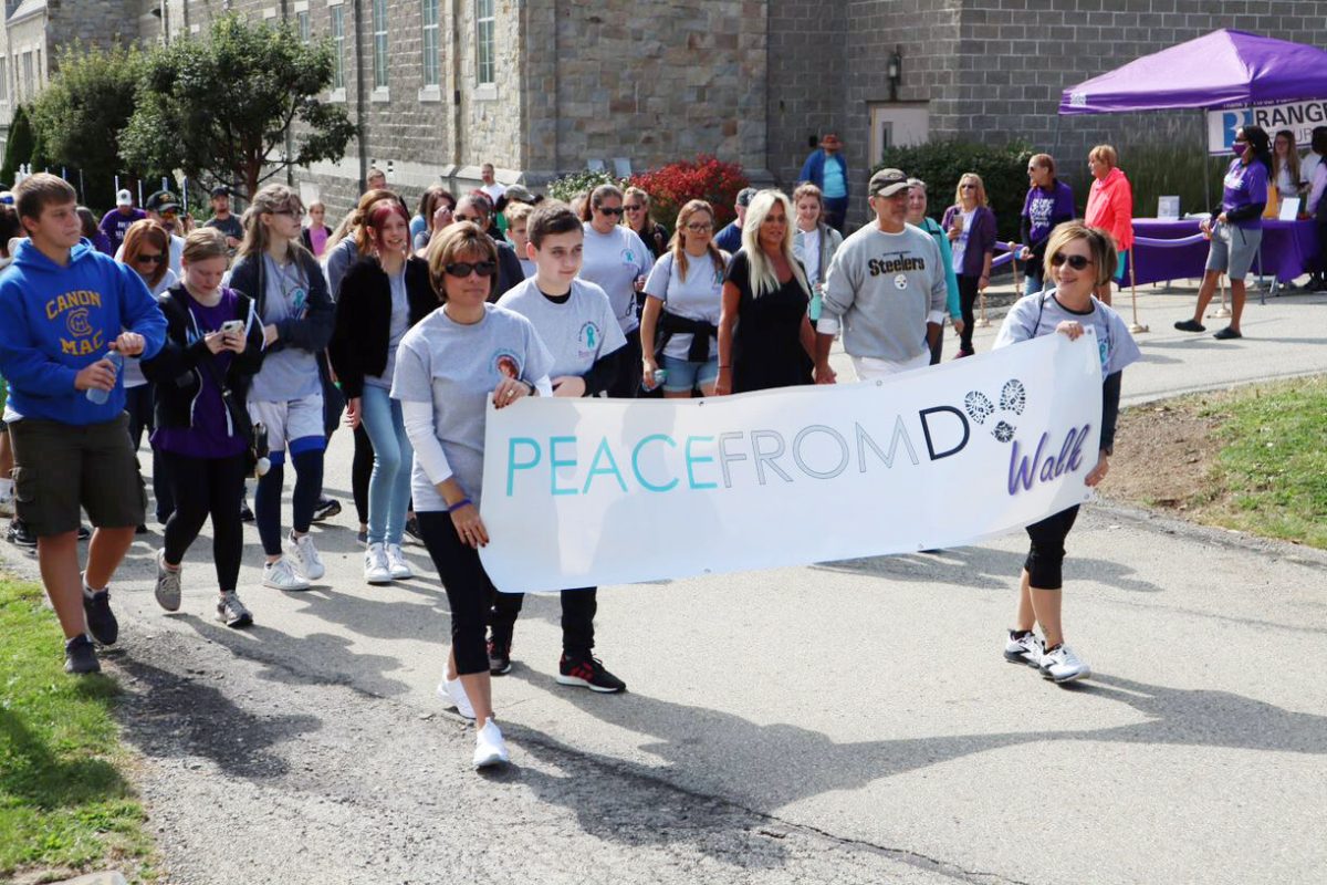 Nonprofit raises awareness of domestic violence this October - Observer ...